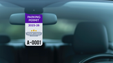 Customizable long parking permit hang tag hanging from rear view mirror.